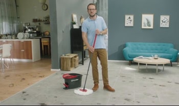 Man with a spin mop.