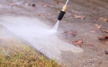 Pressurized water cleans the dirt.